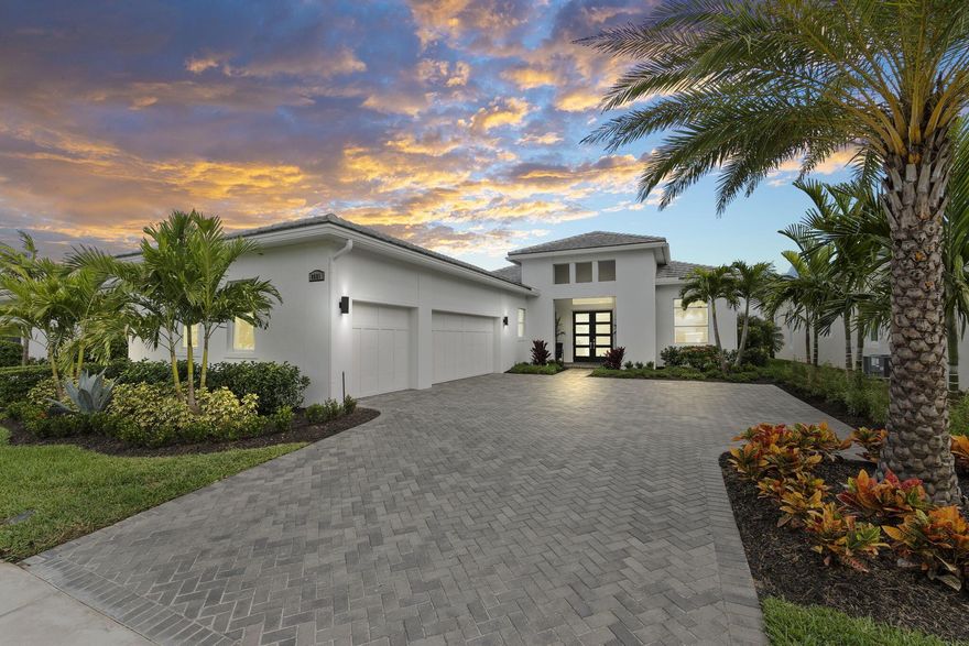 PGA Verano Lifestyle at its finest! This 3 Bed, 3.5 bath 3-car garage MOVE-IN READY Bellacerra home offers unparalleled professionally customized interior design and amenities! You will not find these types of upgrades in any of the builder homes. 
-New frosted hurricane impact front doors (complete hurricane impact windows and doors throughout)  
-New Professionally epoxied garage floors 
-New water heater recirculation pump, water softener and reverse osmosis system 
-Whole house App enabled Sonos surround sound  
-App controlled custom designed pool with submerged spa, 3 waterfall descents, linear gas fire feature, natural stone, glass tile and sealed travertine decking -Tropical landscaping surrounds the pool area for the perfect amount of privacy, framing the spectacular water views of the lake setting. 
-Thermador professional grade appliances with a dual fuel gas range, brass pot filler & faucet with cast iron porcelain farm sink, balanced by and Cambria Quartz countertops and backsplash.
-Automatic remote-controlled shades can transcend an area from brilliant light, to filtered light, or to full darkening in the master suite. (-Custom designed wine display & custom-built barn doors(-Designer selected lighting fixtures with dimmable capability throughout (and much much more! 

PGA Verano Living offers access to state of the art exercise facilities, 27 Pickle-ball Courts, indoor and outdoor pools, dog parks, walking paths and much more for ALL AGES! HOA dues include basic cable, internet, alarm monitoring, security, lawn care, common area maintenance and access to above mentioned amenity facilities. Want your dream home fully furnished and ready to go? ALL FURNITURE can be negotiated in a separate contract!!! Schedule your showing today! Seeing this home in person will WOW you!