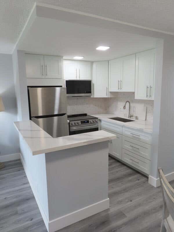 Photo of 101 Hastings G, West Palm Beach, FL 33417 (MLS # B26057924)