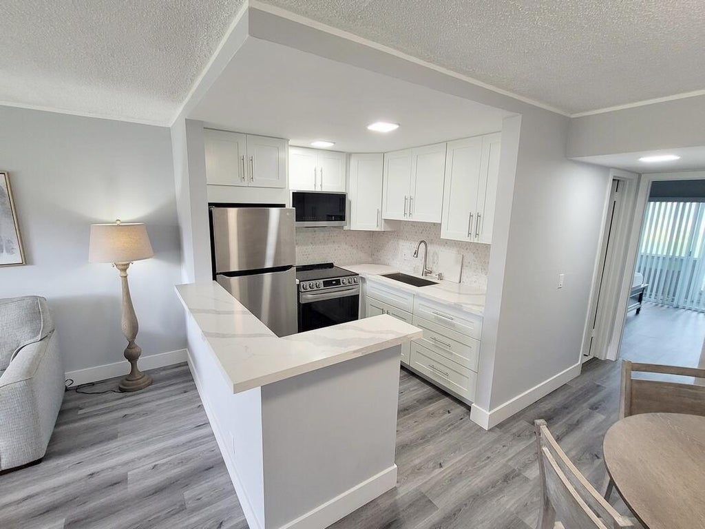 Photo of 101 Hastings G, West Palm Beach, FL 33417 (MLS # B26057924)