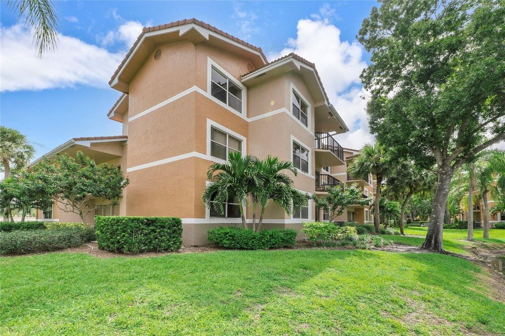 Photo of 8977 Wiles Road #208, Coral Springs, FL 33067 (MLS # F10457688)