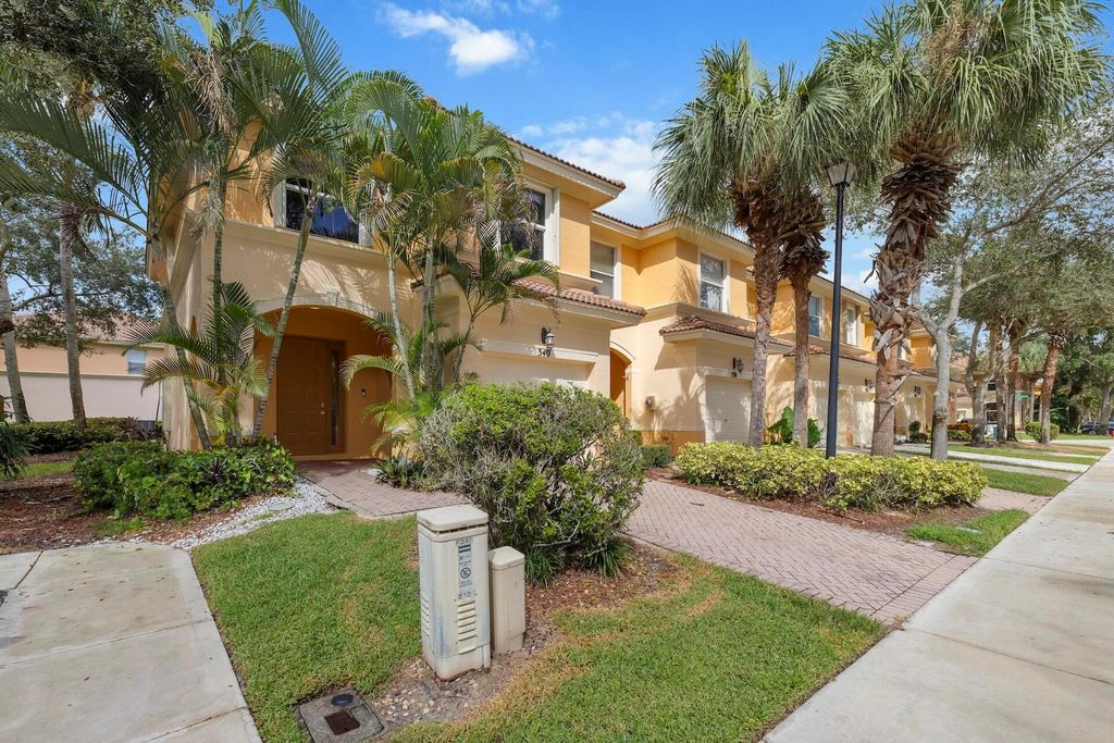 Photo of 340 River Bluff Lane, Royal Palm Beach, FL 33411 (MLS # R11132995)