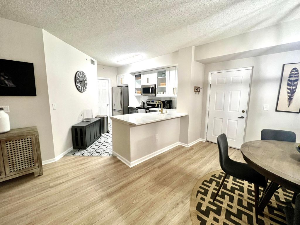 Photo of 11790 St Andrews Place #203, Wellington, FL 33414 (MLS # R10970427)