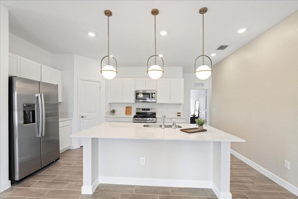 Photo of 5979 NW Pickering Drive, Port Saint Lucie, FL 34987 (MLS # R11081510)