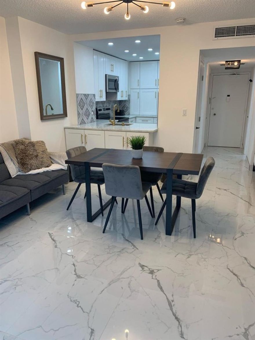 Don't miss this beautifully renovated and fully Furnished condo, Income-Producing!ideal as a turnkey investment or a future homeBrand new kitchen with modern cabinets, countertops, and stainless steel appliancesUpdated bathroom with stylish finishesAll new flooring, lighting, and fixtures throughoutPrivate balcony – perfect for relaxing and enjoying Florida’s beautiful weatherAll appliances included – completely move-in ready!Investor Highlights:Rented for $1,700/monthSame reliable tenant for 3 yearsLease through December 2026Seller will pay half of the special assessmentEnjoy steady rental income from day one with a long-term tenant in place. Whether you’re expanding your investment portfolio or planning ahead for a Florida retreat, this condo checks every box! The Hemispheres offers 2 swimming pools, a marina, 2 fitness centers, tennis courts, basketball courts, putting green, 2 restaurants and snack bar by the pool on the ocean, valet parking and security. The maintenance includes A/C, internet, water & sewer.The condo can be rented once a year for 3 months minimum.