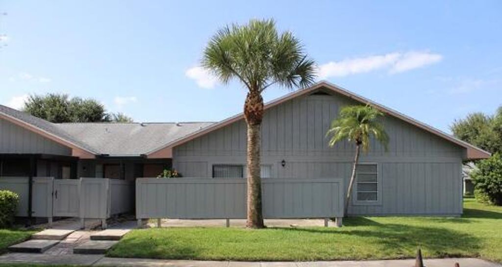 Photo of 4113 NW Cinnamon Tree Circle, Jensen Beach, FL 34957 (MLS # R10928570)