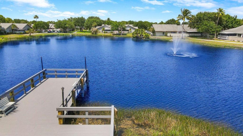 Photo of 4113 NW Cinnamon Tree Circle, Jensen Beach, FL 34957 (MLS # R10928570)