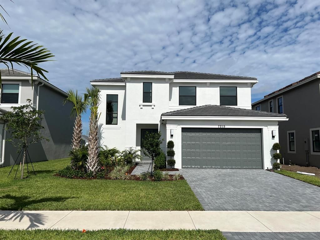 Photo of 7215 Montereal Path Path, Lake Worth Beach, FL 33463 (MLS # R10814487)