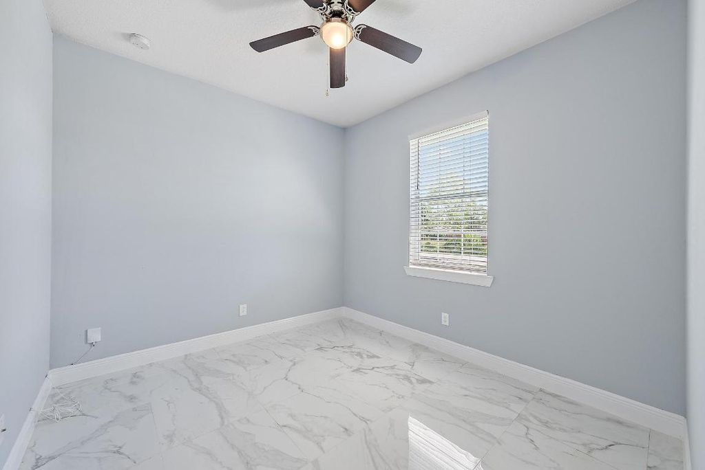 Photo of 4822 SE Flounder Avenue, Stuart, FL 34997 (MLS # R11140733)