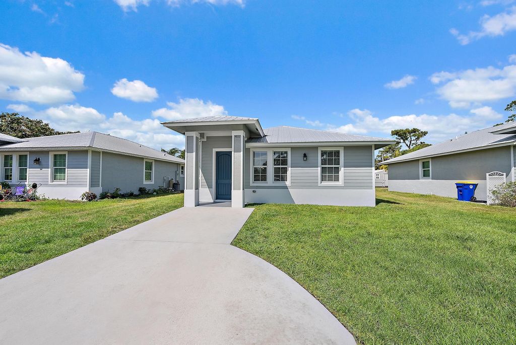 Photo of 4822 SE Flounder Avenue, Stuart, FL 34997 (MLS # R11140733)