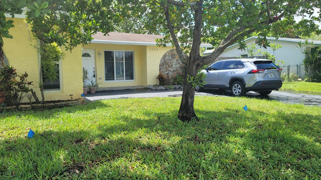 Photo of 2590 NW 98th Avenue, Sunrise, FL 33322 (MLS # B26032608)