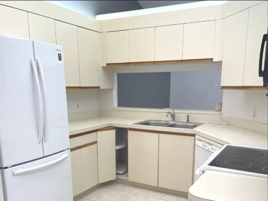 Photo of 6531 SE Federal Highway #E205, Stuart, FL 34997 (MLS # R11148519)