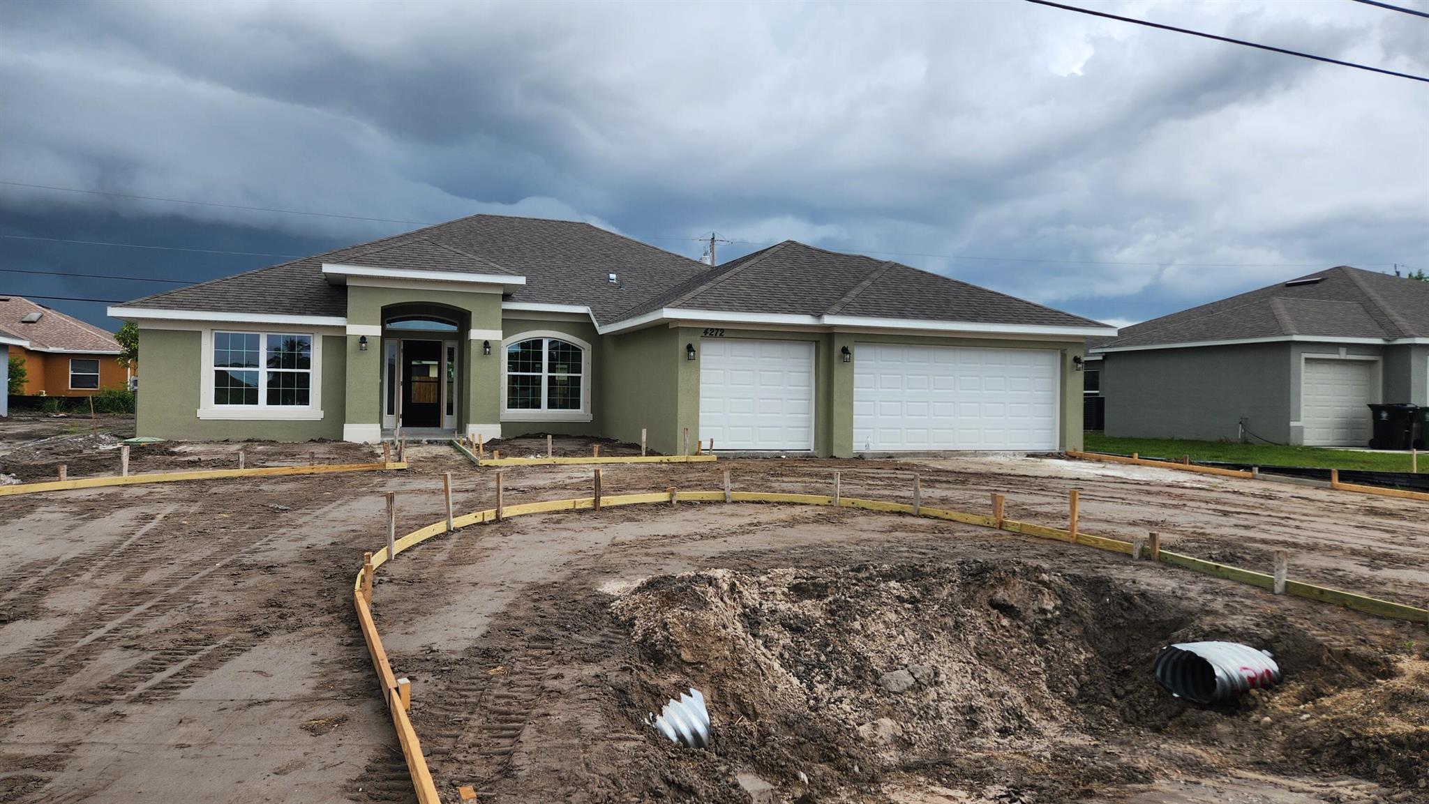 FLEX CASH AVAILABLE! ONLY $1,000 DEPOSIT. Save yourself several thousands of dollars in CLOSING COSTS WHEN USING THE SELLER'S APPROVED LENDER. Your new home is MOVE IN READY and located 2 miles from I-95 and the Turnpike! It also features 4 bedrooms, 3 bathrooms, with a den, a walk in shower and a 3-car garage with vaulted ceilings, tile in main living areas, granite countertops, and a private backyard view from your covered patio. Builder warranty Included.