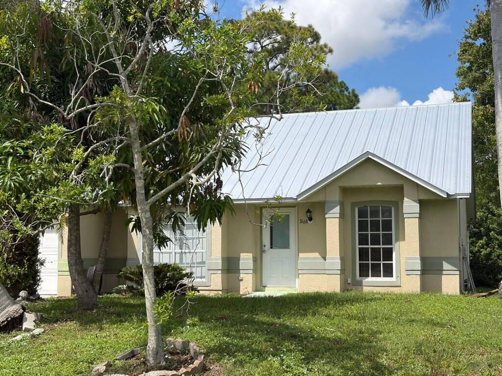 Photo of 3166 SW DIMATTIA Street, Port Saint Lucie, FL 34953 (MLS # B26075718)
