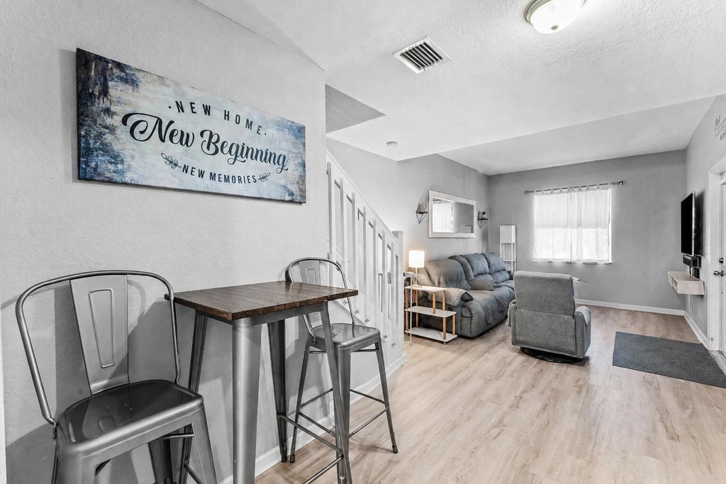 Photo of 2928 HIDDEN HILLS Road #1404, West Palm Beach, FL 33411 (MLS # B26068010)