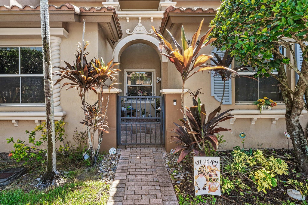 Photo of 2928 HIDDEN HILLS Road #1404, West Palm Beach, FL 33411 (MLS # B26068010)