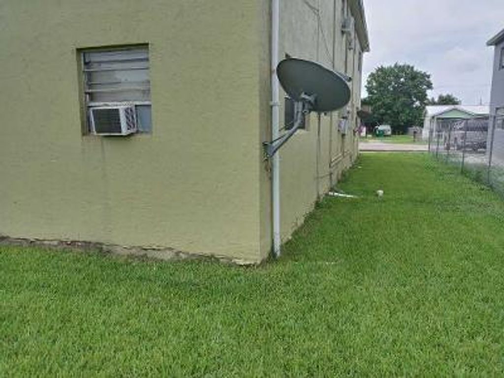 Photo of 423 N Cocoanut Road #1, Pahokee, FL 33476 (MLS # R10994331)