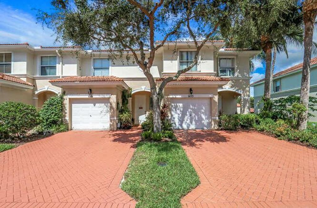 Photo of 6151 Seminole Gardens Circle Cir, Riviera Beach, FL 33418 (MLS # R10827495)