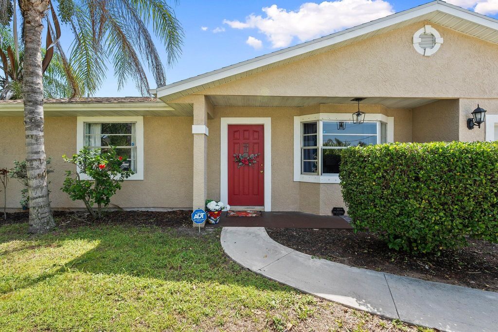 Photo of 1986 SW Aquarius Lane, Port Saint Lucie, FL 34984 (MLS # R11104130)