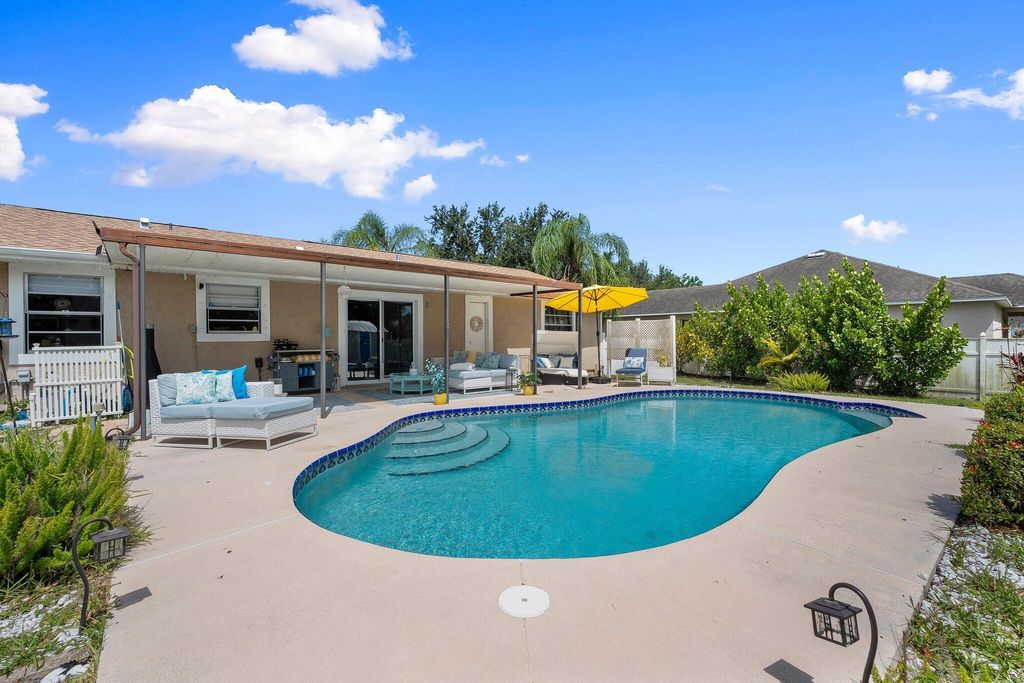 Photo of 1986 SW Aquarius Lane, Port Saint Lucie, FL 34984 (MLS # R11104130)