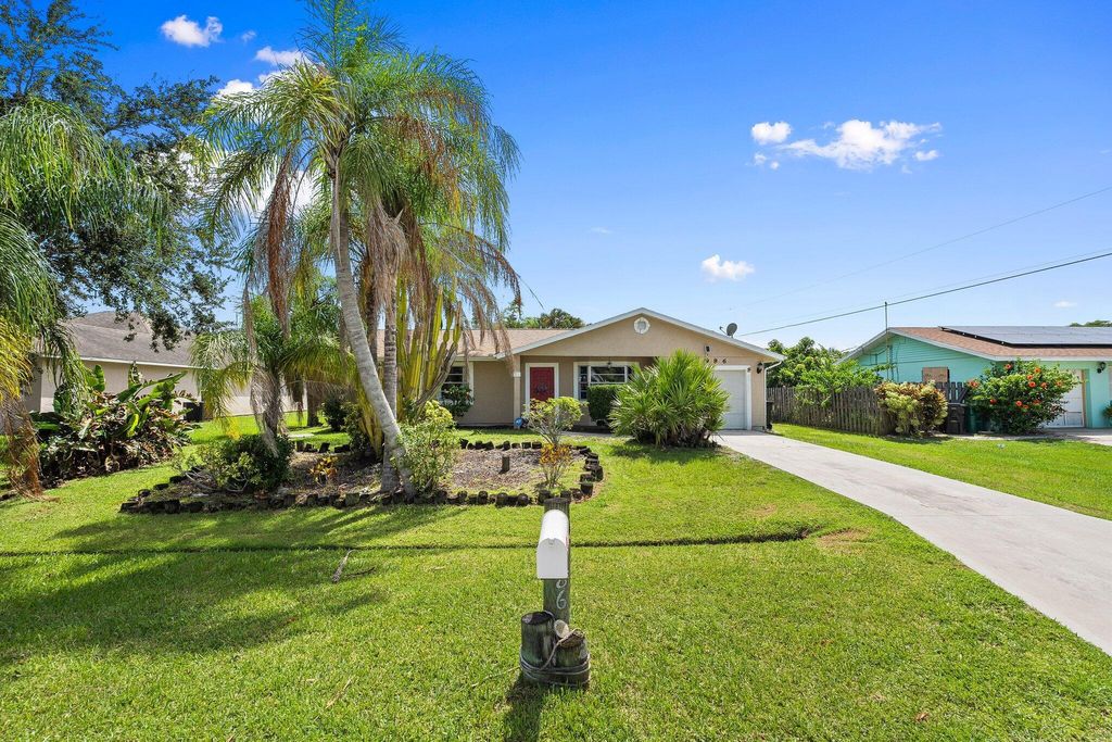 Photo of 1986 SW Aquarius Lane, Port Saint Lucie, FL 34984 (MLS # R11104130)