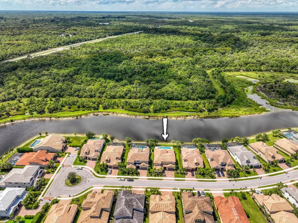 Photo of 241 Blanca Isles Lane, Jupiter, FL 33478 (MLS # R11124782)