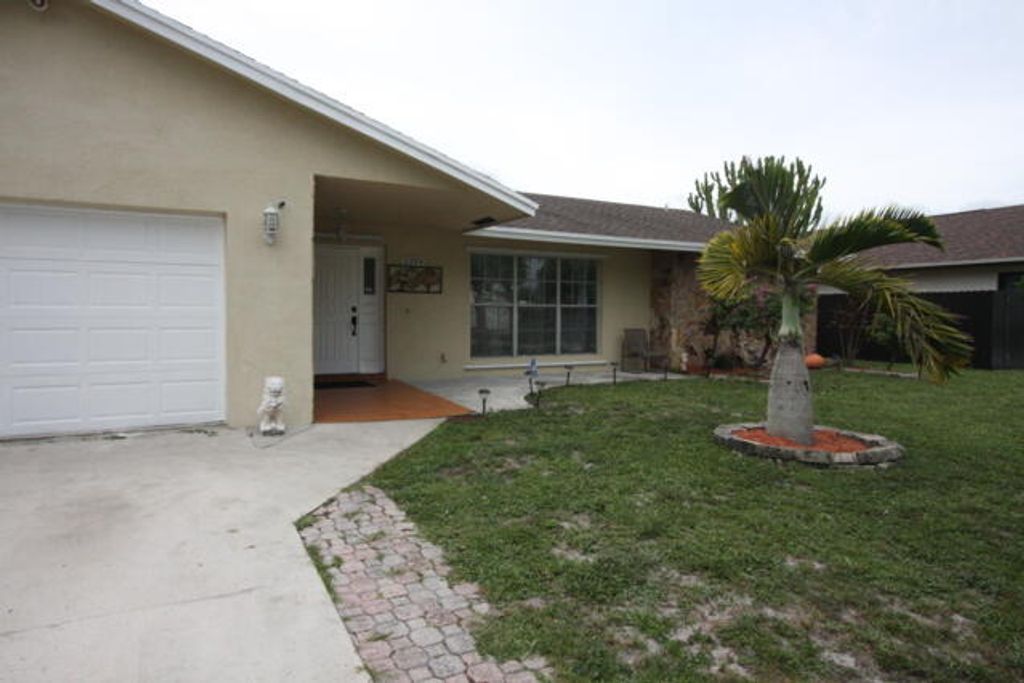 Photo of 5199 Woodstone Circle E, Lake Worth, FL 33463 (MLS # R11098484)