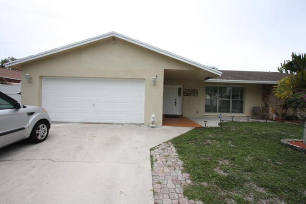 Photo of 5199 Woodstone Circle E, Lake Worth, FL 33463 (MLS # R11098484)