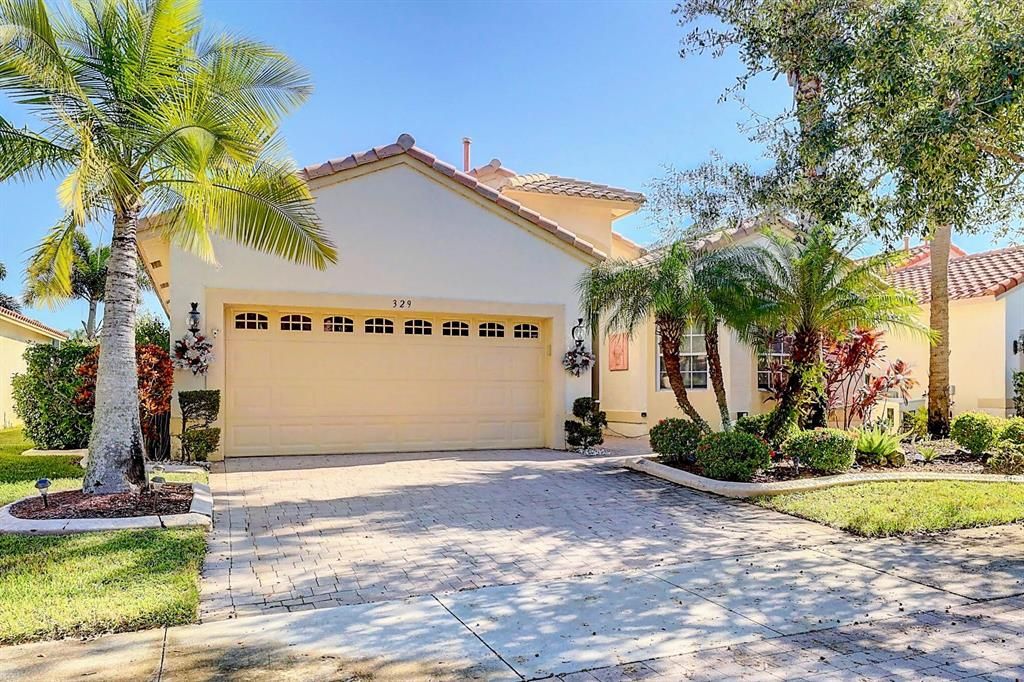 Photo of 329 NW Toscane Trail Trl, Port St Lucie, FL 34986 (MLS # R10762572)