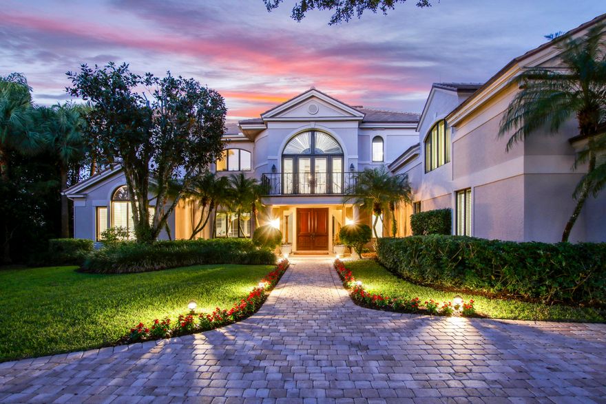 Classic luxury with exquisite lake and golf views from one of Loblolly's largest and most prestigious estate homes. Beautifully sited on one of the premiere lots, this custom built residence has endless features and does not disappoint. 
Double mahogany doors and volume ceilings welcome you into the grand foyer of this more than 8700 square foot refined home. Stunning formal living and dining room with double fireplace, adjoins to a spacious and bright Florida room with wall of sliders overlooking the sun drenched pool and spa. Enjoy cooking and entertaining with family and friends in the well-appointed kitchen with an open flow to the great room which features beamed vaulted ceilings. 
The six ensuite bedrooms each provide their own sanctuary. Comfortably spaced, every bedroom offers generous closets. The main floor primary suite includes Primary Bedroom, large Primary Bathroom, office/ den and sunroom with access to the pool and spa, providing owners or out of town guests a separate living quarters. Second story primary suite is generous in size and comfort, with breathtaking views of the 8th Green and a truly expansive walk-in closet. 
Additional second floor bedrooms each have their own ensuite bathroom and outdoor seating space. Two of the suites open to a stunning lanai with sweeping golf and lake views. 
 Exceedingly large ensuite bedroom/dormitory, an ideal space for family game night, in home movies, housing family overflow or creating a unique space of your own. Could be an amazing Media room, or grandchild dormitory.