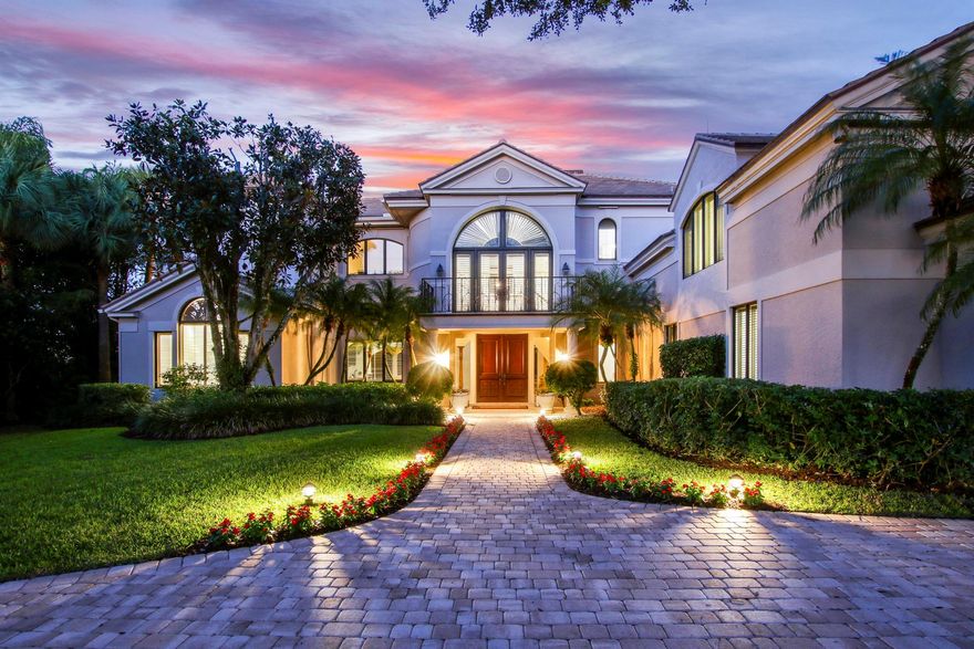 Classic luxury with exquisite lake and golf views from one of Loblolly's largest and most prestigious estate homes. Beautifully sited on one of the premiere lots, this custom built residence has endless features and does not disappoint. Double mahogany doors and volume ceilings welcome you into the grand foyer of this more than 8700 square foot refined home. Stunning formal living and dining room with double fireplace, adjoins to a spacious and bright Florida room with wall of sliders overlooking the sun drenched pool and spa. Enjoy cooking and entertaining with family and friends in the well-appointed kitchen with an open flow to the great room which features beamed vaulted ceilings. The six ensuite bedrooms each provide their own sanctuary. Comfortably spaced, every bedroom