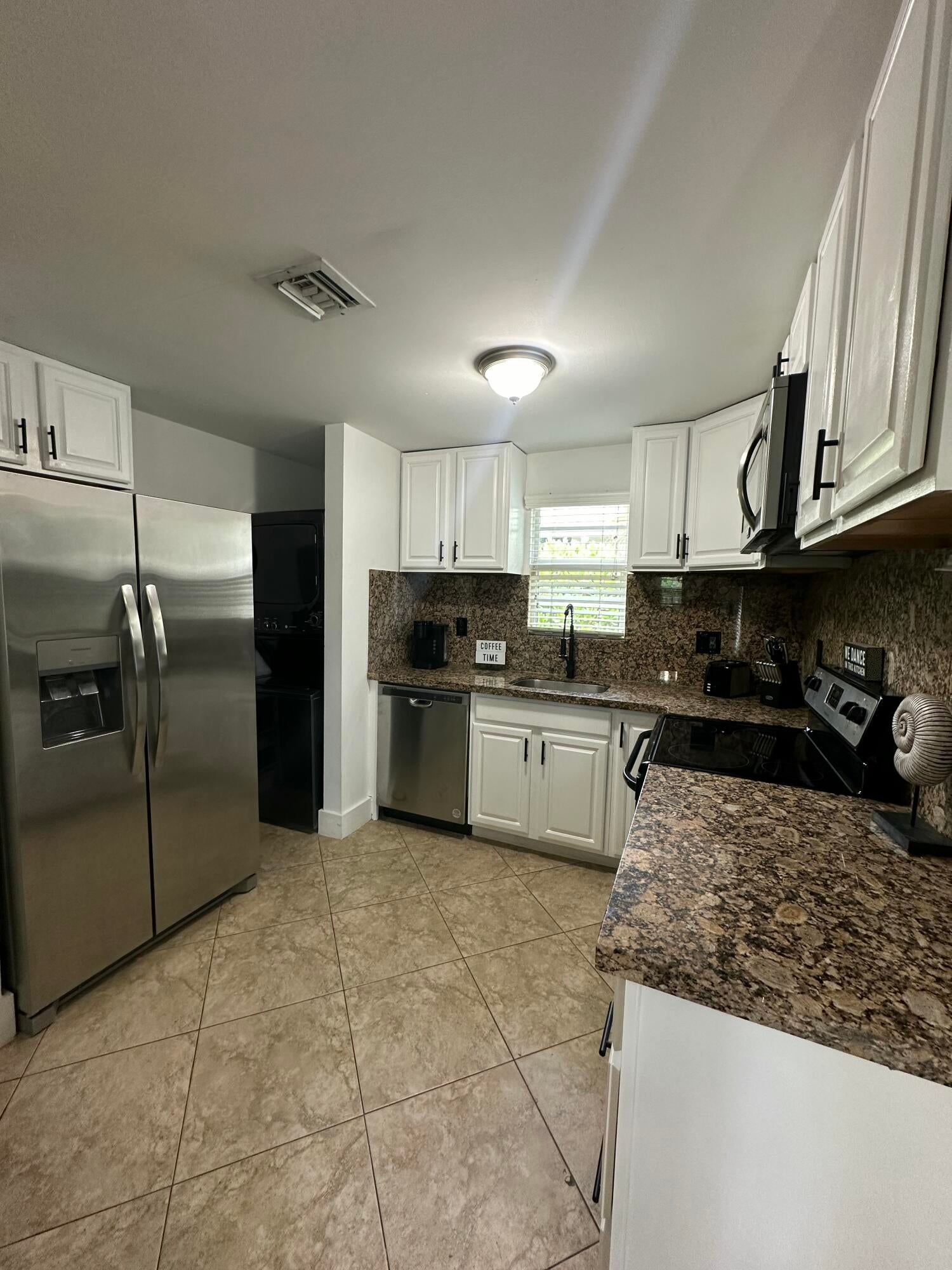View photos, virtual tours, details... 2703 NE 6TH Avenue