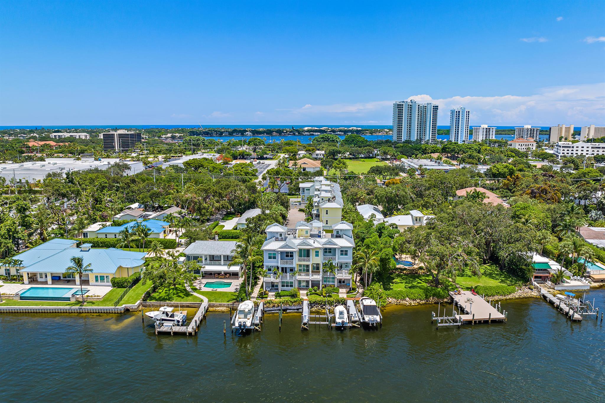 BOAT SLIP INCLUDED - Luxury 3BR/4.1BA end-unit townhouse with 3,673 SF of living space plus rooftop terrace with Intracoastal views. Built in 2019, this spacious home offers a bonus room with bar, gourmet kitchen, private elevator, 2-car garage, and Savant smart home system. Expansive primary suite features walk-in closet and dual baths; all guest rooms are en suite. Located directly on the Intracoastal in a no-wake zone, enjoy the lowest PSF with dockage in Palm Beach Gardens. Minutes to beaches, shopping, dining, and both Jupiter & Palm Beach Inlets.