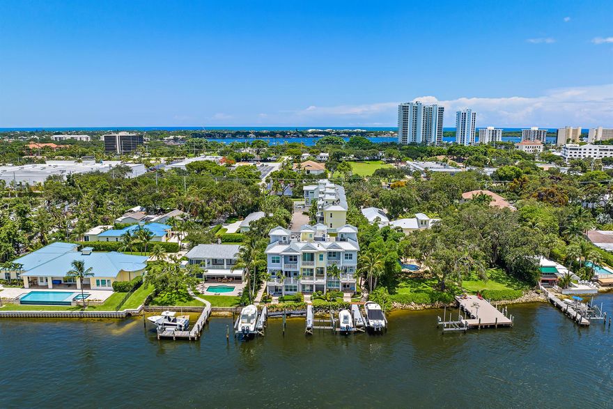BOAT SLIP INCLUDED - Luxury 3BR/4.1BA end-unit townhouse with 3,673 SF of living space plus rooftop terrace with Intracoastal views. Built in 2019, this spacious home offers a bonus room with bar, gourmet kitchen, private elevator, 2-car garage, and Savant smart home system. Expansive primary suite features walk-in closet and dual baths; all guest rooms are en suite. Located directly on the Intracoastal in a no-wake zone, enjoy the lowest PSF with dockage in Palm Beach Gardens. Minutes to beaches, shopping, dining, and both Jupiter & Palm Beach Inlets.