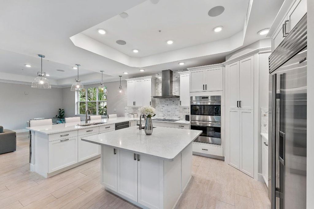Photo of 1033 Harbor Villas Drive #4, North Palm Beach, FL 33408 (MLS # R11129324)