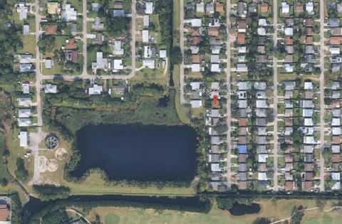 Photo of 5868 SE Collins Avenue, Stuart, FL 34997 (MLS # B26013076)