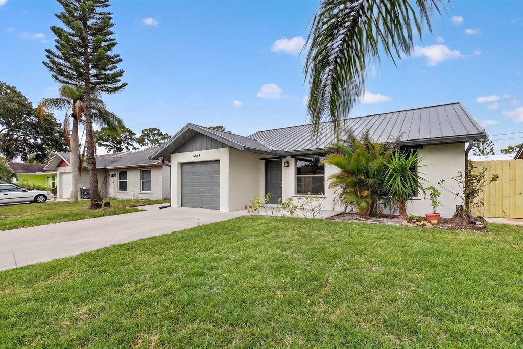 Photo of 5868 SE Collins Avenue, Stuart, FL 34997 (MLS # B26013076)