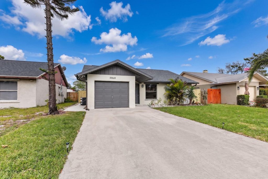 Photo of 5868 SE Collins Avenue, Stuart, FL 34997 (MLS # B26013076)