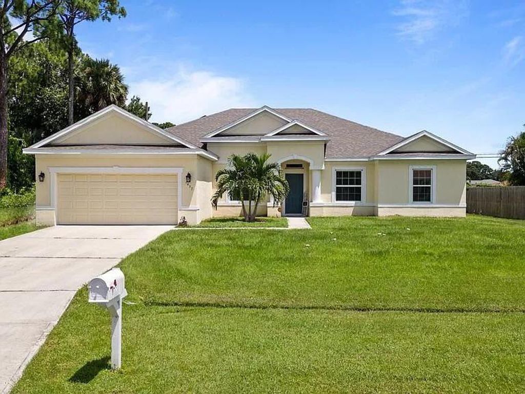 Photo of 1437 SW Goodman Avenue, Port Saint Lucie, FL 34953 (MLS # F10428323)