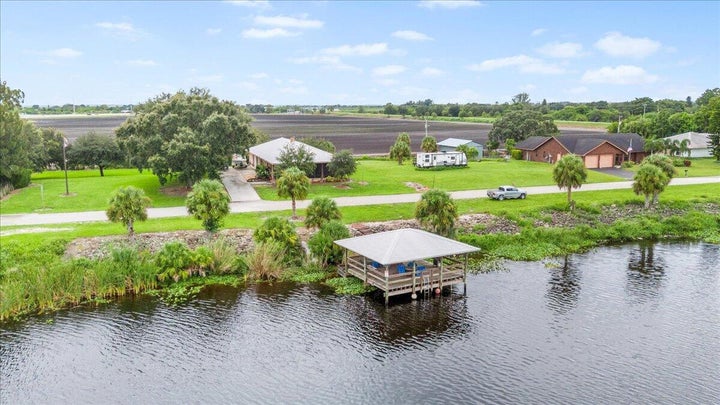 Photo 1 of 39 — 1121 River Road, Moore Haven, FL 33471