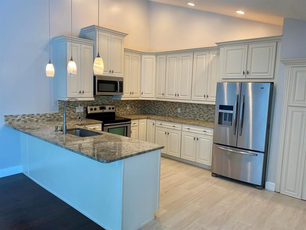 Photo of 5751 Golden Eagle Circle, Palm Beach Gardens, FL 33418 (MLS # R10787602)