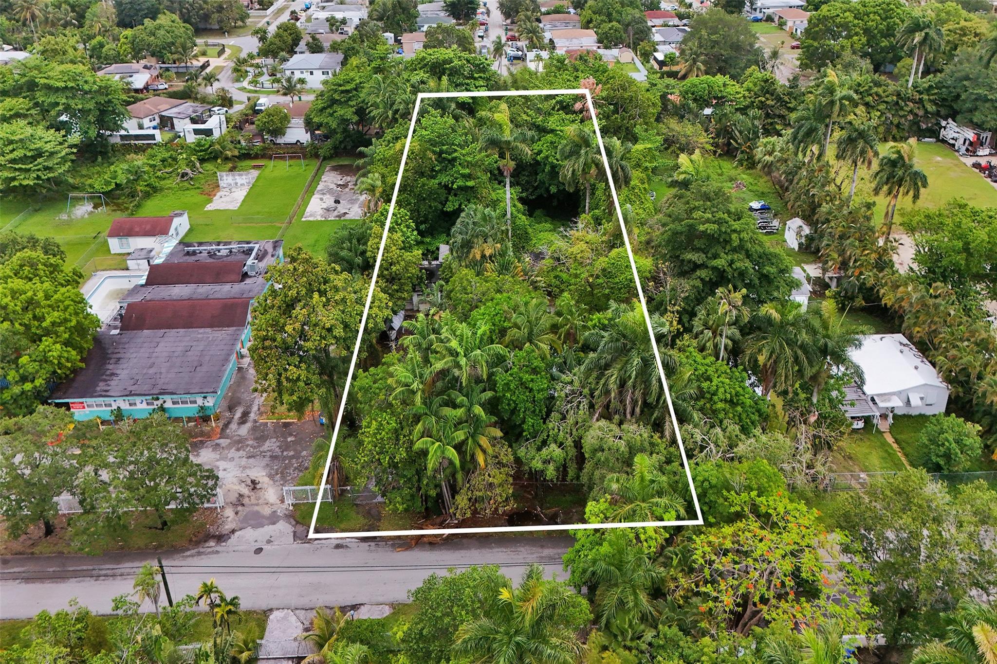 Excellent investment opportunity at 453 NE 154th St, Miami, FL 33162! This property sits on a massive 40,392 sq. ft. lot and features two detached 2 bed/1 bath units. Located near the NE 6th Ave Corridor, it's perfect for redevelopment—build a spec home, church, or a small subdivision. Zoned for flexibility and close to major roads, schools, and shopping. Adjacent property at 477 NE 154th St is also available, offering a combined 70,000+ sq. ft. of land for a larger project. Rare chance to own in a growing area with tons of potential!