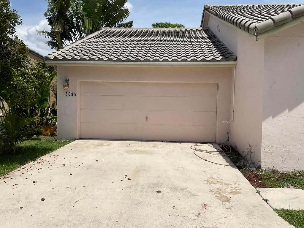 Photo of 6099 Farmers Place, Lake Worth, FL 33463 (MLS # B26061649)