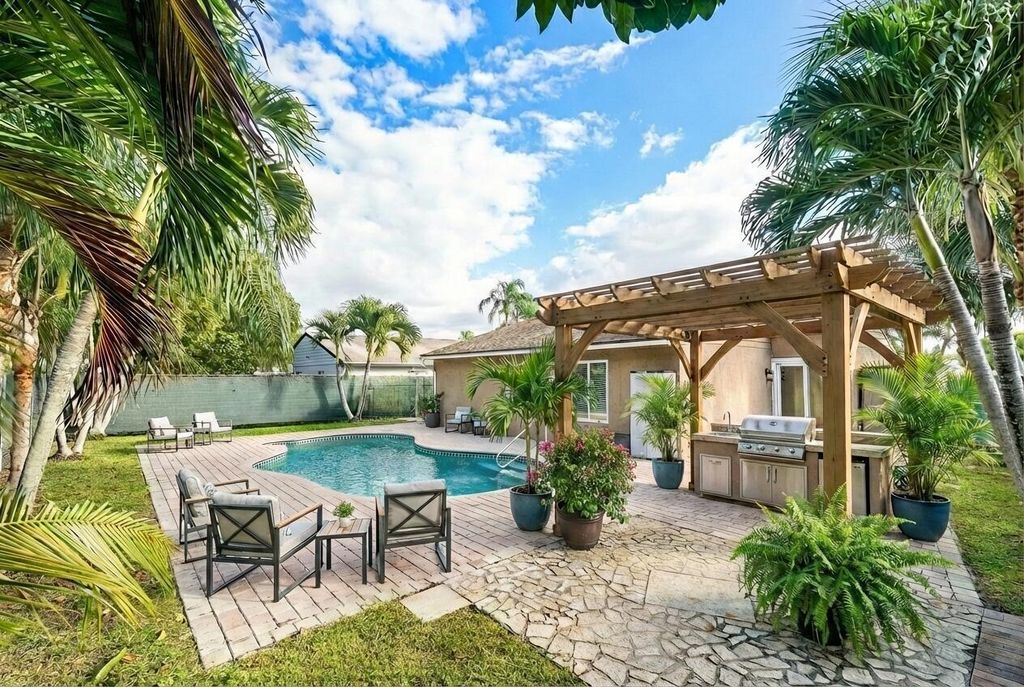 Photo of 8411 Garden Gate Place, Boca Raton, FL 33433 (MLS # B26028747)