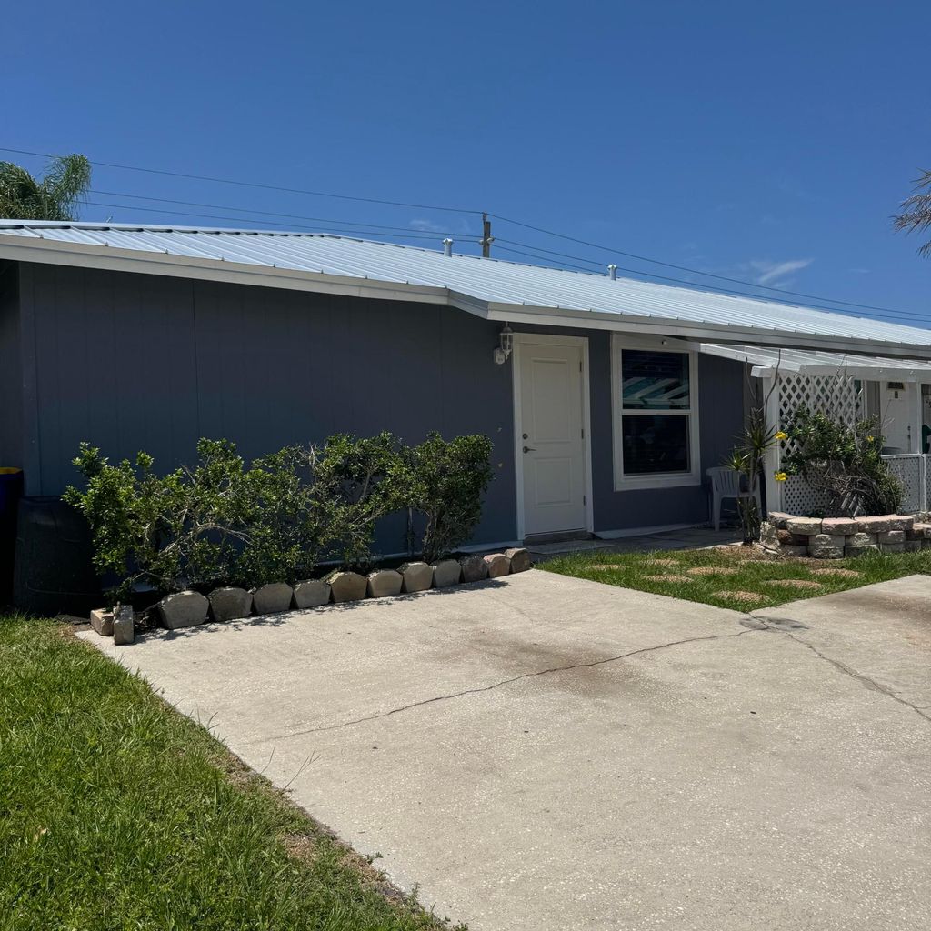 Photo of 4421 SE Village Road, Stuart, FL 34997 (MLS # B26032400)