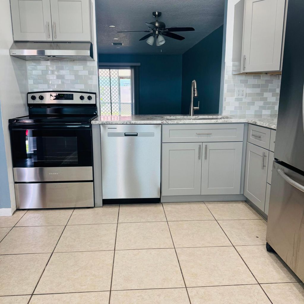 Photo of 4421 SE Village Road, Stuart, FL 34997 (MLS # B26032400)