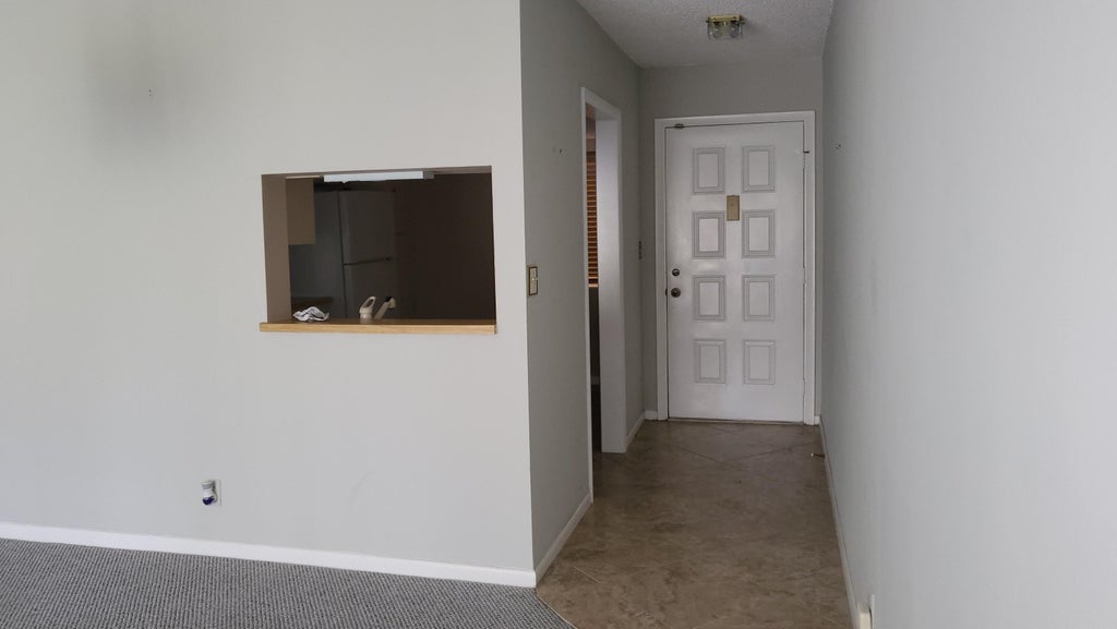 Photo of 3212 STRAWFLOWER Way #220, Lake Worth, FL 33467 (MLS # B26090354)