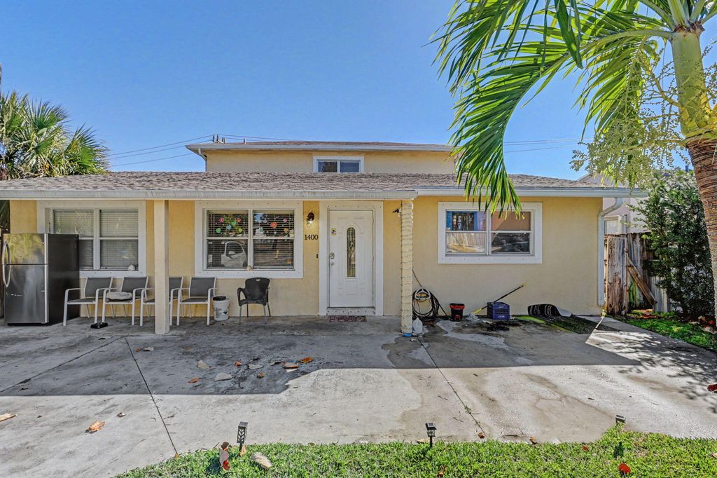 Photo of 1400 Cardinal Lane, Lantana, FL 33462 (MLS # R11166623)