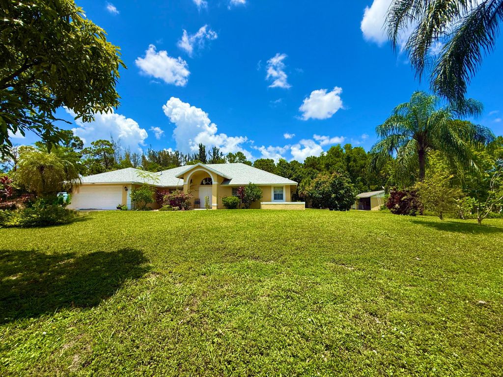 Photo of 13947 63rd Lane N, The Acreage, FL 33412 (MLS # R11111272)