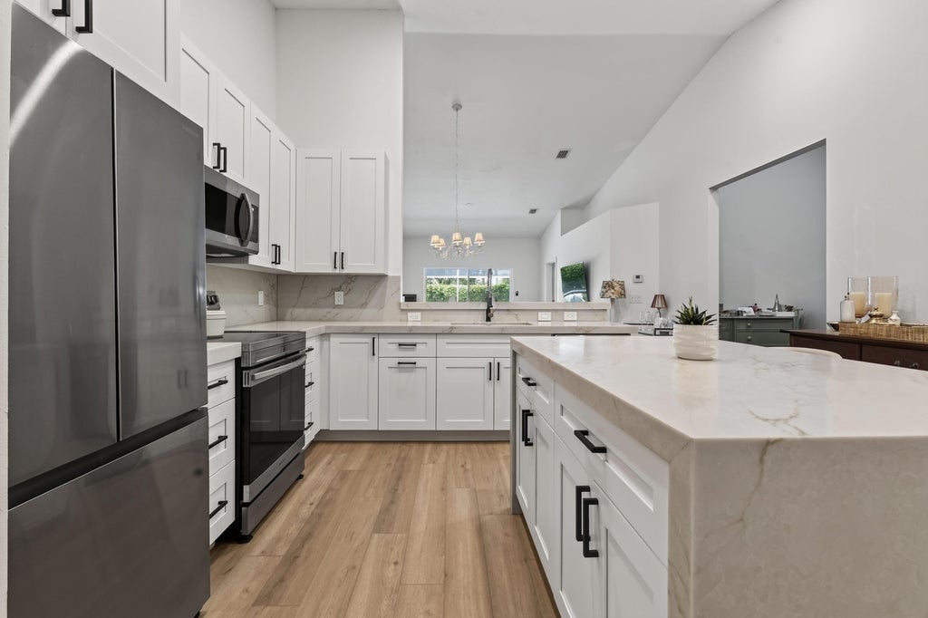 Photo of 8402 Logia Circle, Boynton Beach, FL 33472 (MLS # B26056004)