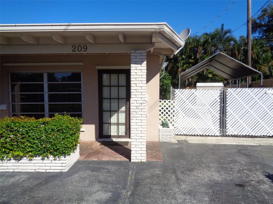 Great Wilton Manors location a 1/1 apt end unit in a well maintained triplex. 2 parking spaces in tandem w/one covered space inside gate. One block off Andrews Ave on a quiet street. Vaulted ceilings, tile floors, impact windows &/or shutters for windows. Central Air, updated kitchen & bath w/shared laundry included in rent. Shared back yard but each unit has it's own patio. Pls bring completed application, credit rpt w/650+ score, background check, proof of income & contact info of employer. Current &/or past landlord references. 1st, last & security.